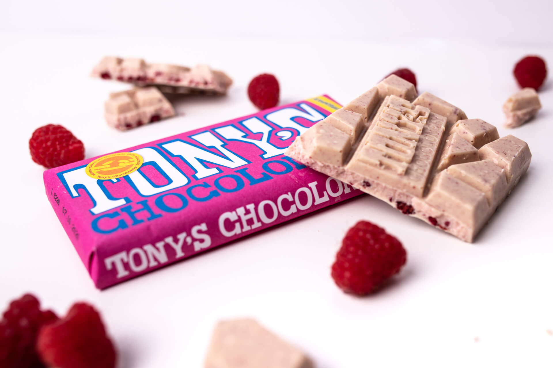 Tony’s Chocolonely Bílá čokoláda, maliny a praskající cukr 180 g Obrázek